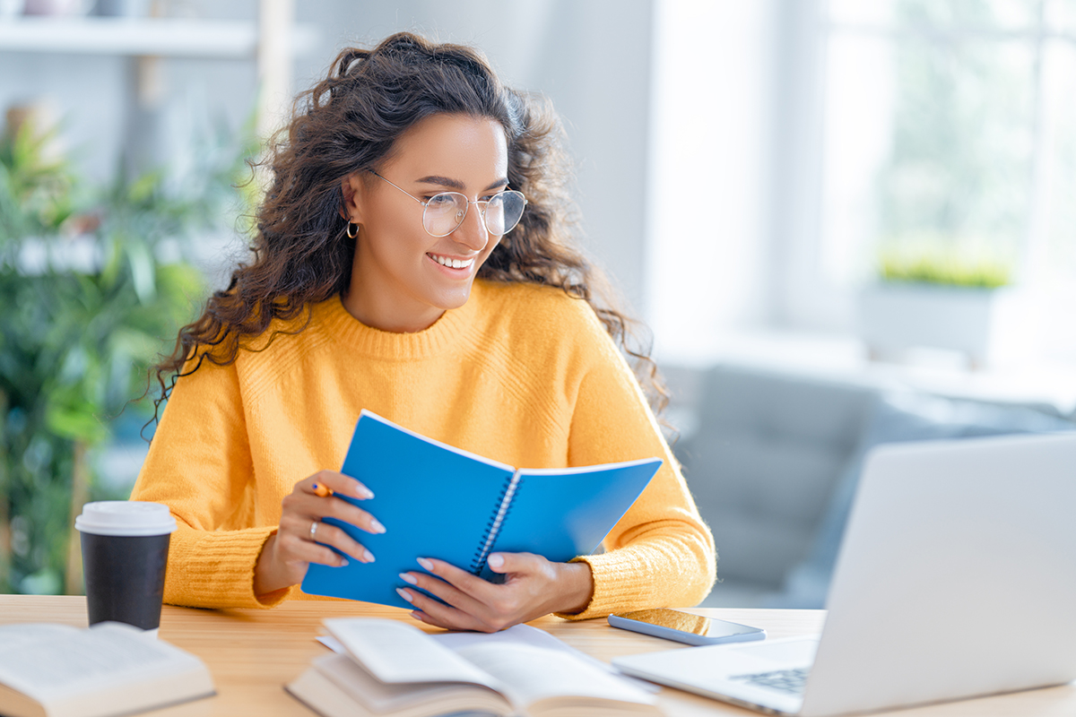 woman working on laptop at home.